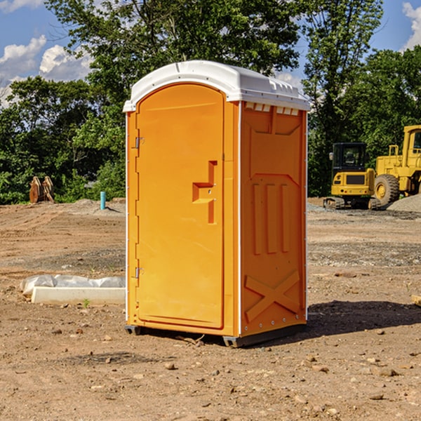 how often are the porta potties cleaned and serviced during a rental period in Hancock